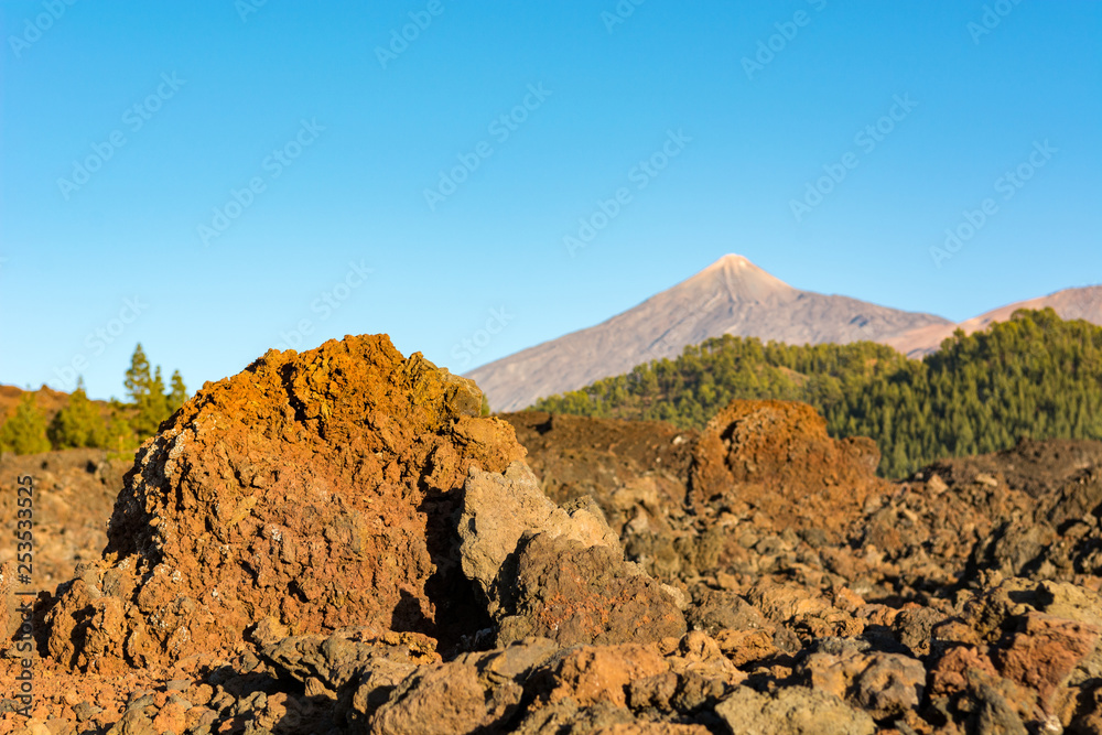 Spectacular volcanic landscape with old lava flow at sunset.