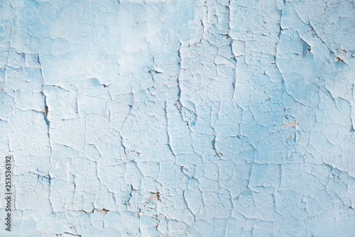 blue texture with scratches and cracks. blue background. blue and white pattern