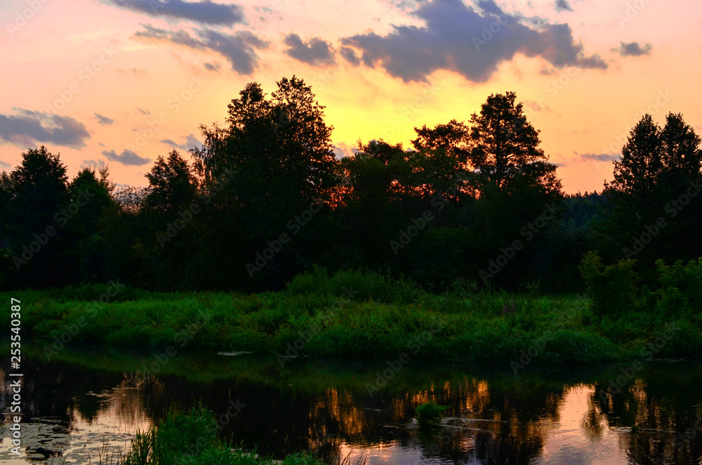 Beautiful summer landscape with sunrise in the morning on the river 