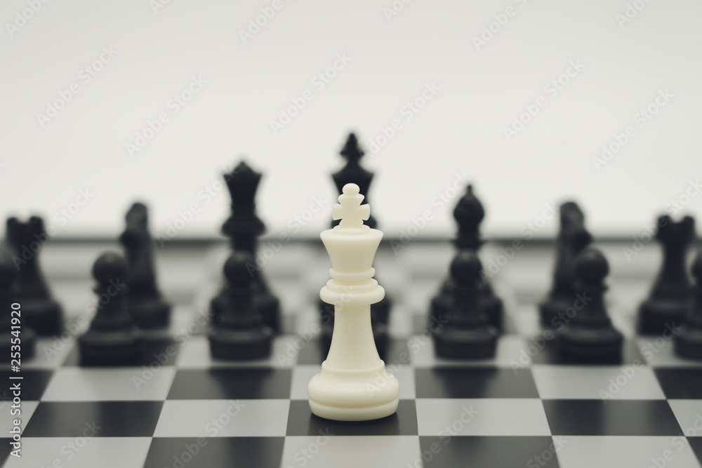 chessboard with a chess piece on the back Negotiating in business. as background business concept and strategy concept with copy space. chessboard with a chess piece on the back Negotiating in business. as background business concept and strategy concept with copy space.