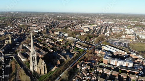 An aerial view of Church of St Walburge, Preston flying past the church on a winter sunny day photo