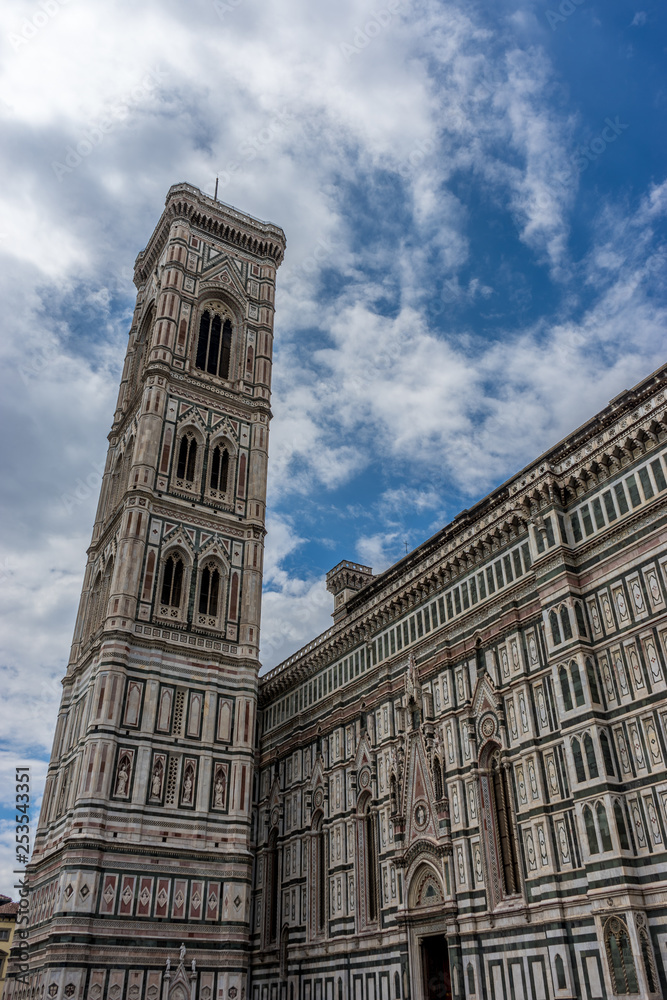 Italy,Florence, Giotto's Campanile, a large clock tower on a cloudy day with Giotto's Campanile in the background