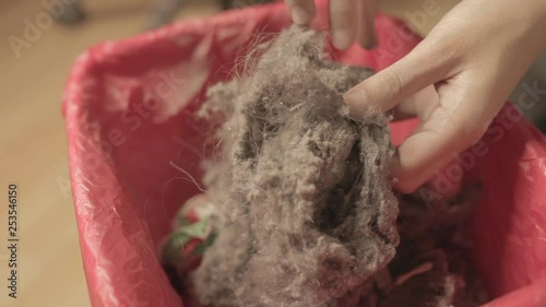 Dirty bin with a lot of dust and hair