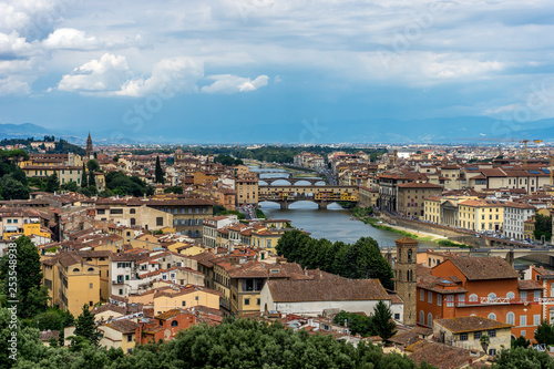 Panaromic view of Florence townscape cityscape viewed from Piazzale Michelangelo (Michelangelo Square) with ponte Vecchio and Palazzo Vecchio with lightningPanaromic view of Florence townscape citysca