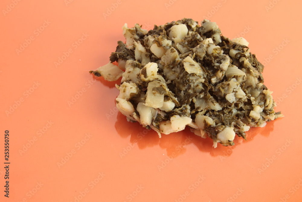 delicious chard with potato on orange background delicious chard with potato on orange background