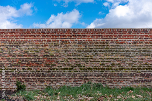 red wall and blue sky
