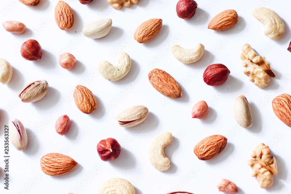 Pattern of nuts mix: cashew, hazelnuts, walnuts, almonds 