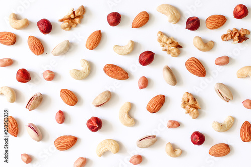 Pattern of nuts mix: cashew, hazelnuts, walnuts, almonds. Lactose free food