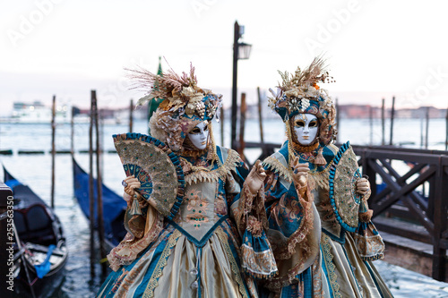 Unidentified person with Venetian Carnival mask in Venice, Italy on February © Andrey Cherkasov