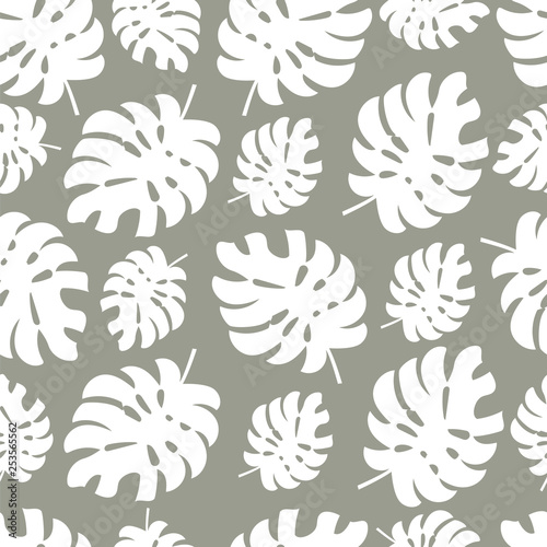 monstera leaves. silhouette of tropical leaves. seamless pattern