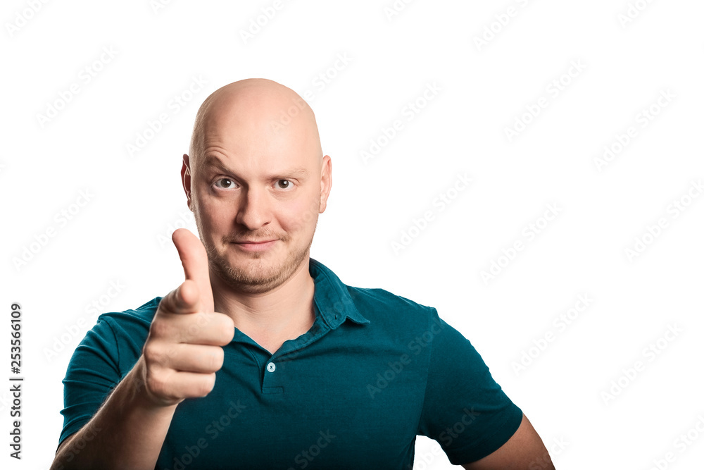 Young man pointing finger to the camera, feeling confident. Young man pointing finger to the camera, feeling confident.