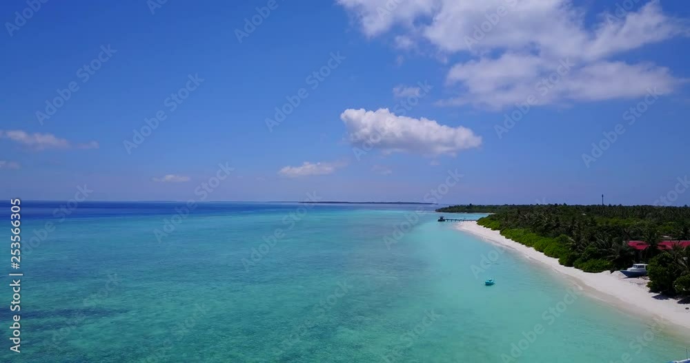 Aerial jib shot, tropical waters in Maldives islands, breathtaking travel scene Aerial jib shot, tropical waters in Maldives islands, breathtaking travel scene
