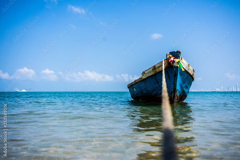 Traditional wooden thai boat dangles on the sea. Thailand. 4k. Traditional wooden thai boat dangles on the sea. Thailand. 4k.