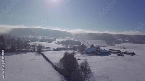 The Cloud are crushing like waves above the Hill - Winter Wonderland photo