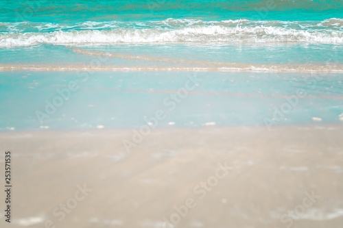 Blue ocean wave on sandy beach.nature idea background.blue soft tone