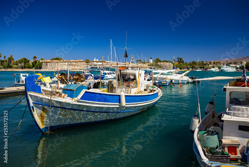Greek fishing boats moored in Kos fishing port © Sergey Kelin
