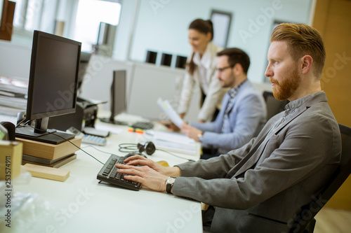 Young people working in the...