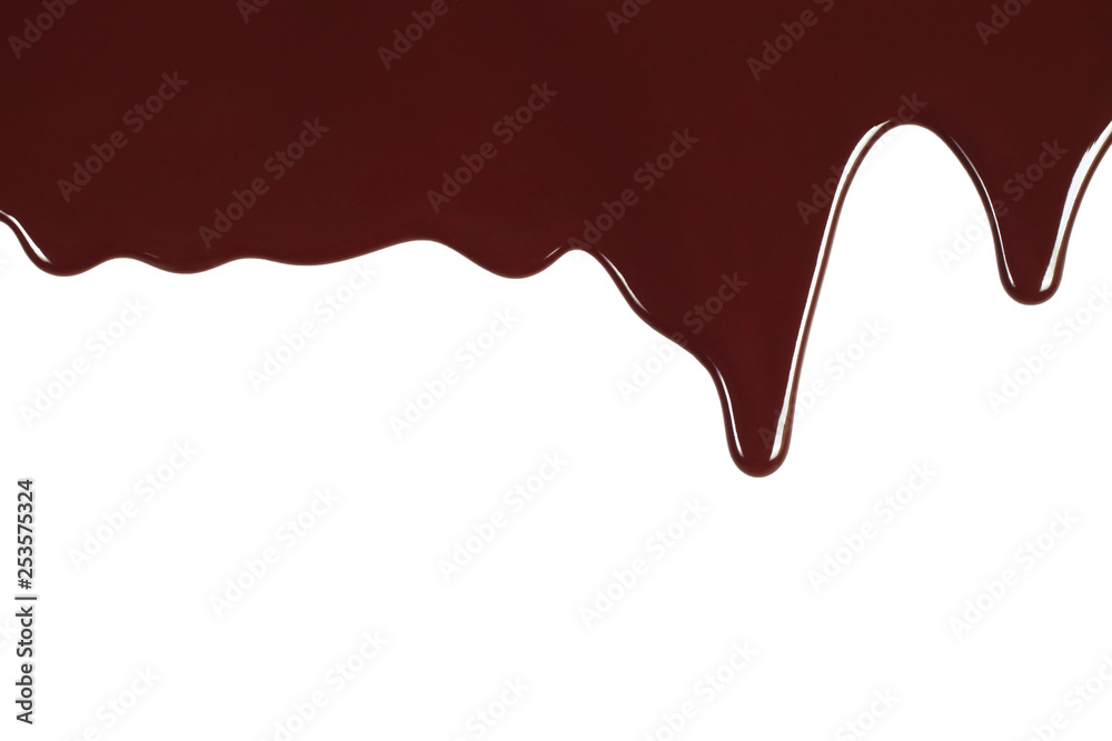 Melted chocolate dripping on white background Melted chocolate dripping on white background