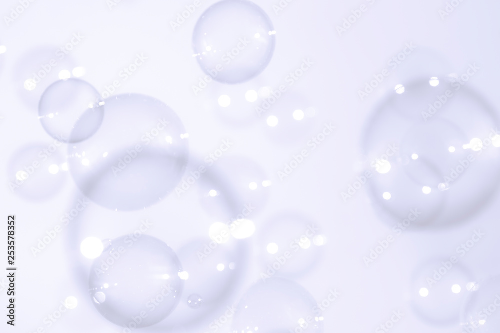 Soap bubbles float background.
