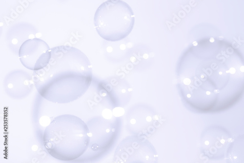 Soap bubbles float background.