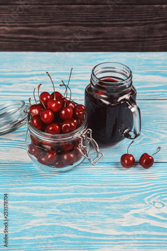 Cherry juice with glass jar...