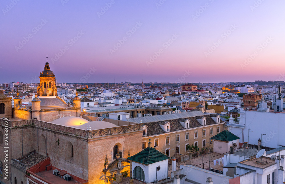 Seville, Spain. City skyline at dusk. Historical architecture