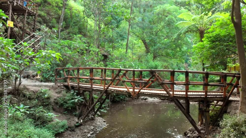 Beautiful nature view of river with bamboo bridge Beautiful nature view of river with bamboo bridge