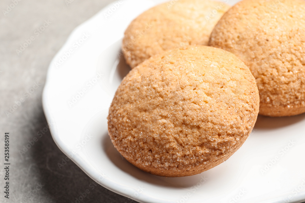 Plate with Danish butter cookies on table, closeup