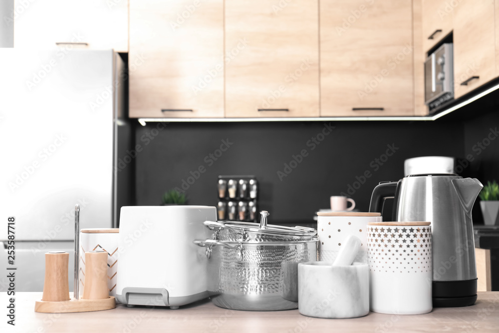 Set with modern domestic appliances in kitchen Set with modern domestic appliances in kitchen