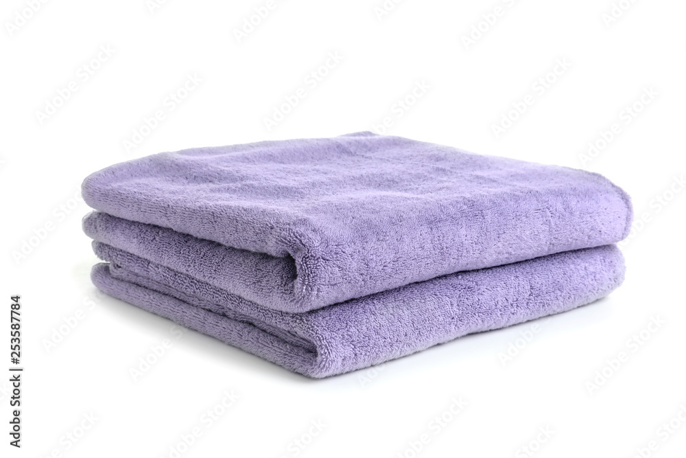 Folded clean soft towels on white background Folded clean soft towels on white background