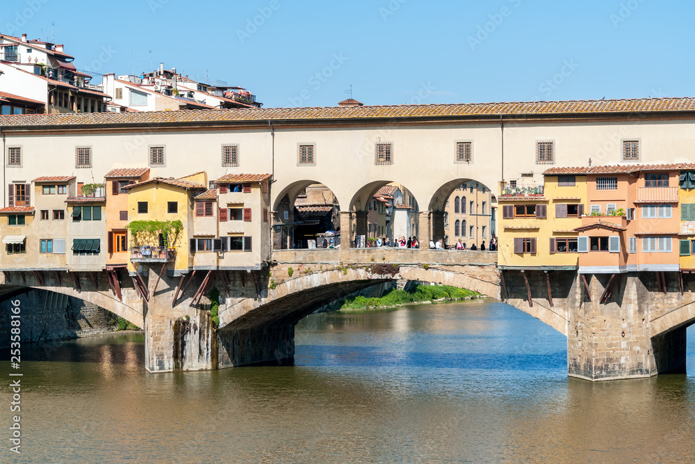 Closeup view of Ponte Vecchio old bridge over river Arno - Florence, Tuscany, Italy. Built in Roman times, it was the only bridge across the Arno in Florence until 1218