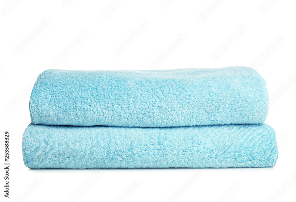 Folded soft terry towels on white background Folded soft terry towels on white background