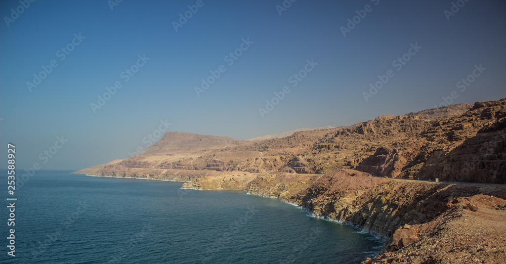 dead sea waterfront beautiful panorama scenery landscape with long bare mountain ridge along shoreline dead sea waterfront beautiful panorama scenery landscape with long bare mountain ridge along shoreline