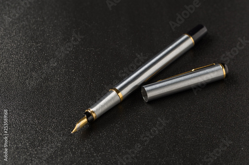 Fountain pen with clipping path on black background