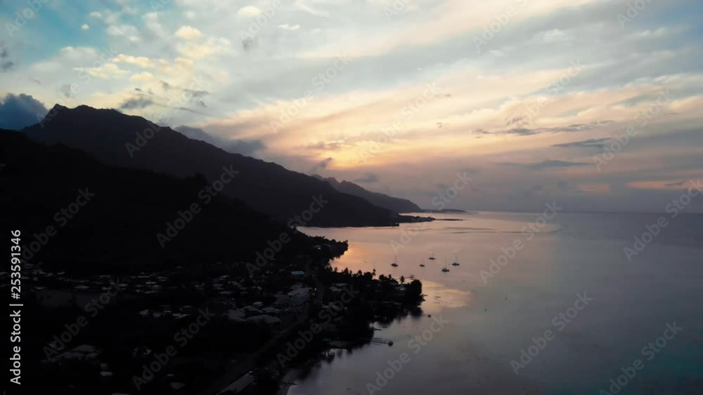 Sunset panoramic aerial view from Opunohu Bay. Moorea, French Polynesia, Tahiti, South Pacific Ocean. Sunset panoramic aerial view from Opunohu Bay. Moorea, French Polynesia, Tahiti, South Pacific Ocean.