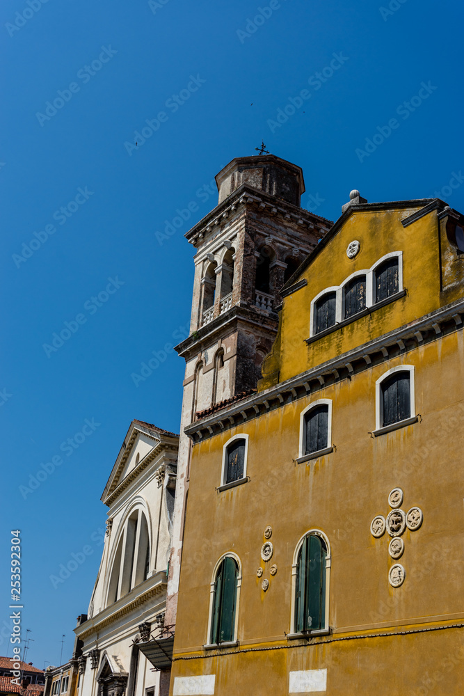 Italy, Venice, a clock on the side of a building