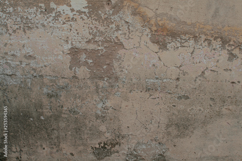  Close up of a concrete wall with moisture and breaks