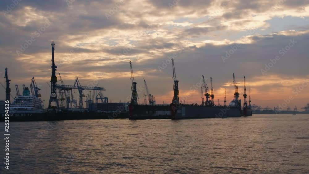 Steamboat at Hamburg Harbour with beautiful sky in the evening in Slow Motion Steamboat at Hamburg Harbour with beautiful sky in the evening in Slow Motion