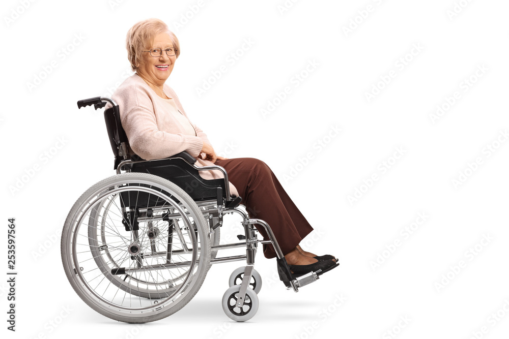 Senior woman in a wheelchair smiling at the camera Senior woman in a wheelchair smiling at the camera