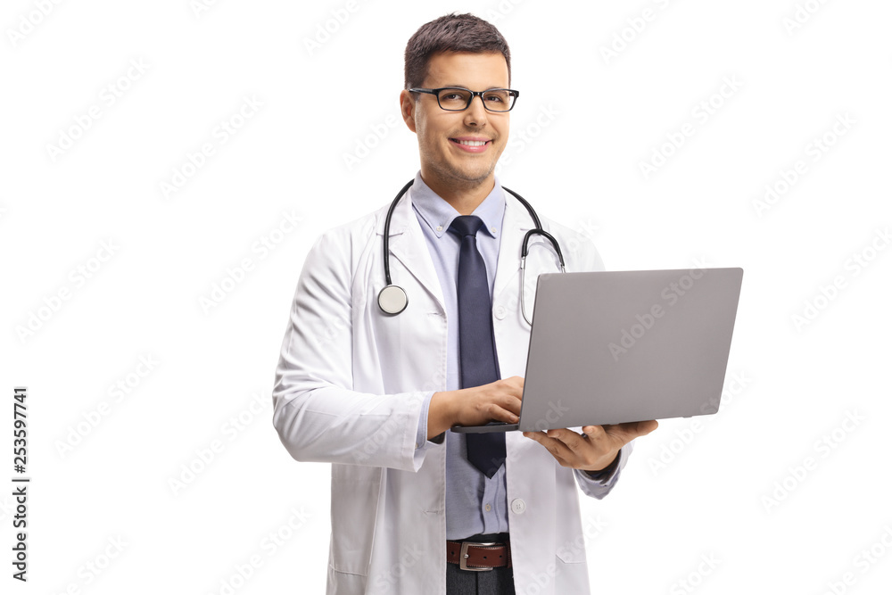 Young male doctor holding a laptop computer and smiling at the camera Young male doctor holding a laptop computer and smiling at the camera