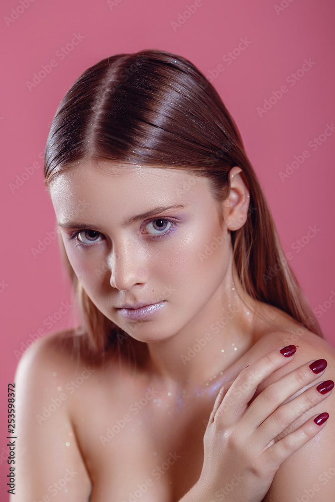 glamor woman in glasses on a pink background glamor woman in glasses on a pink background
