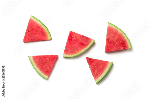 Slices of Fresh Watermelon on a white isolated background. Flat lay, top view