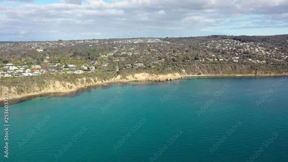 Elevated aerial view over the clear turquoise water and cliffs of Mount Martha, Melbourne Elevated aerial view over the clear turquoise water and cliffs of Mount Martha, Melbourne