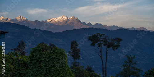 Scenic view of Siniolchu mountain, Bhalu Khop Village, Sikkim, India photo