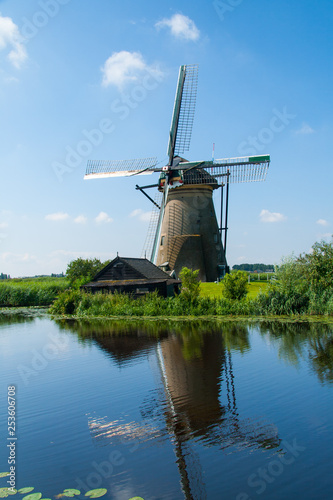 Kinderdijk windmills clean energy in Holland on a clear day