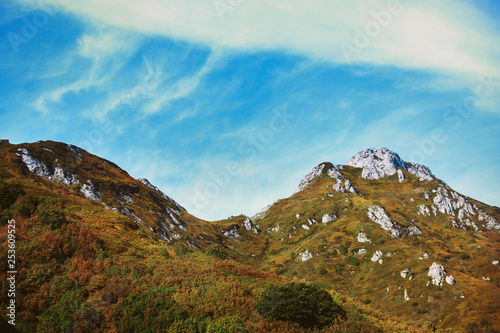 Sunny day. Mountains. Landscape. Nature. Rocks. Blue sky © Amina