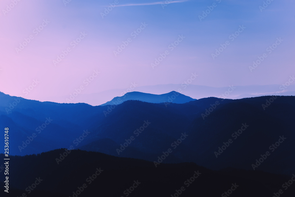 Morning purple haze in the mountains. Coniferous Forest. Beautiful landscape Morning purple haze in the mountains. Coniferous Forest. Beautiful landscape