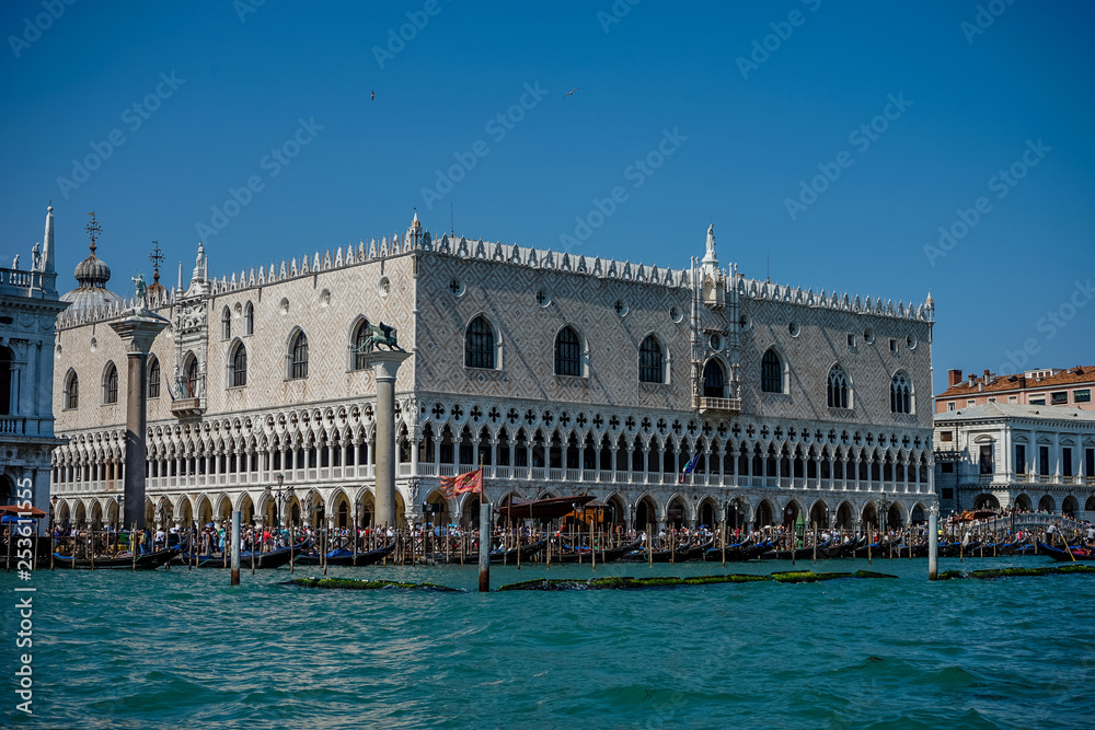 Italy, Venice, Doge's Palace, a large white building surrounded by water with Doge's Palace in the background
