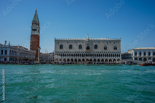 Italy, Venice, Piazza San Marco, VIEW OF BUILDINGS BY CANAL AGAINST SKY IN CITY © SkandaRamana