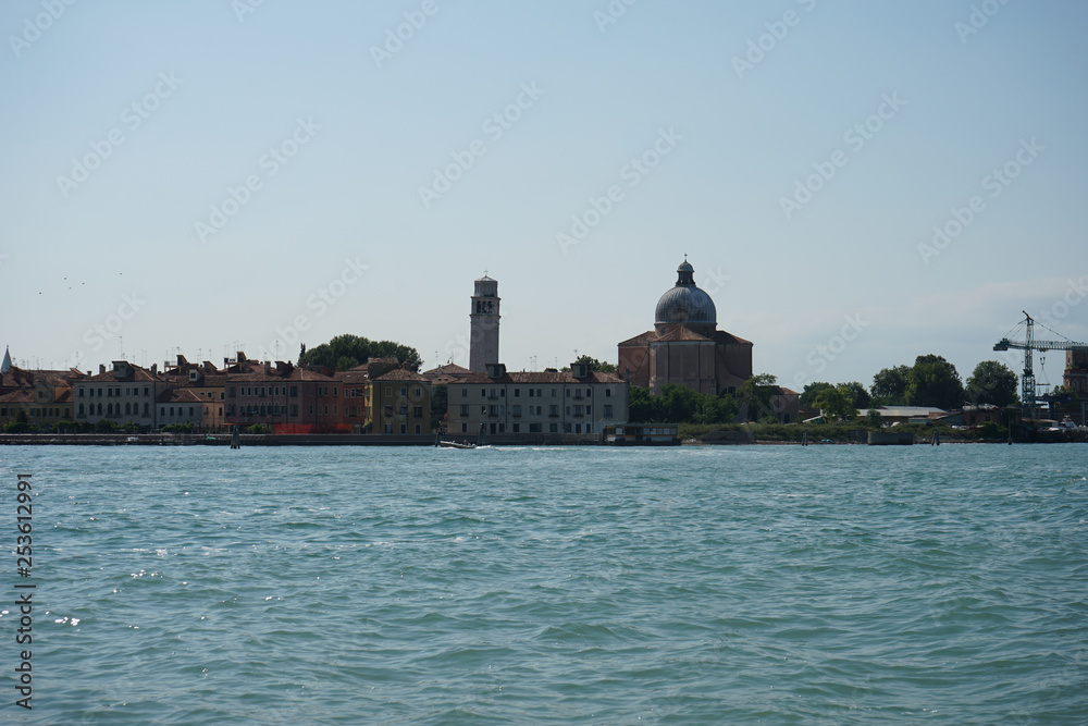 Italy, Venice, a large body of water with a city in the background